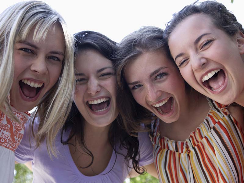 Women friends laughing together
